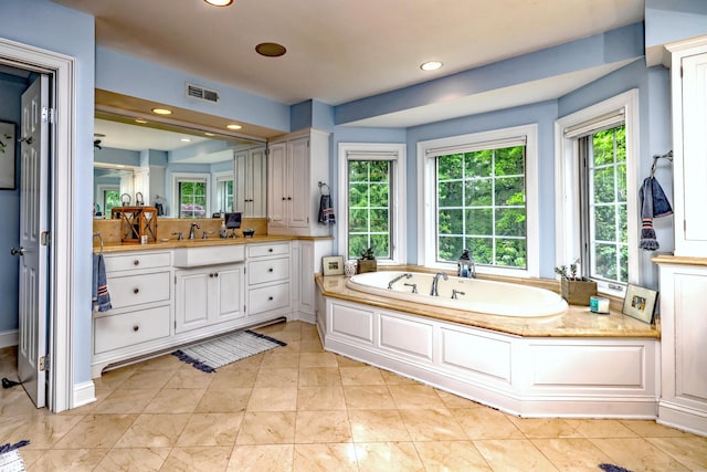 10 Grove Hill Rd, Woodbridge, CT 06525 - full bath with healthy amount of natural light, vanity, a bath, and recessed lighting