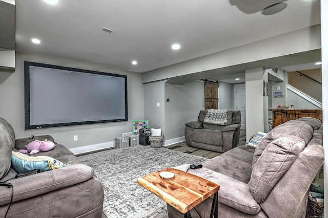 10 Grove Hill Rd, Woodbridge, CT 06525 - home theater with wood finished floors, a barn door, baseboards, and recessed lighting
