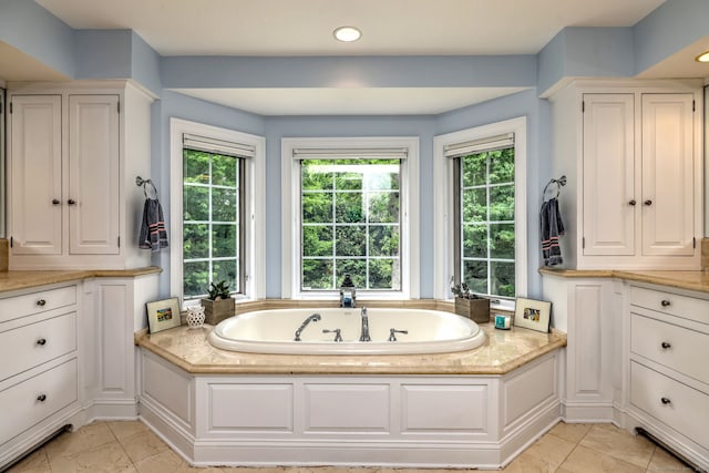 10 Grove Hill Rd, Woodbridge, CT 06525 - bathroom featuring plenty of natural light, a bath, recessed lighting, and marble look tile flooring