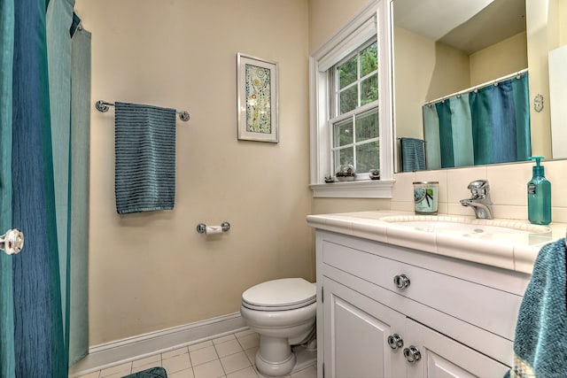 10 Grove Hill Rd, Woodbridge, CT 06525 - full bathroom with tile patterned floors, toilet, vanity, and baseboards