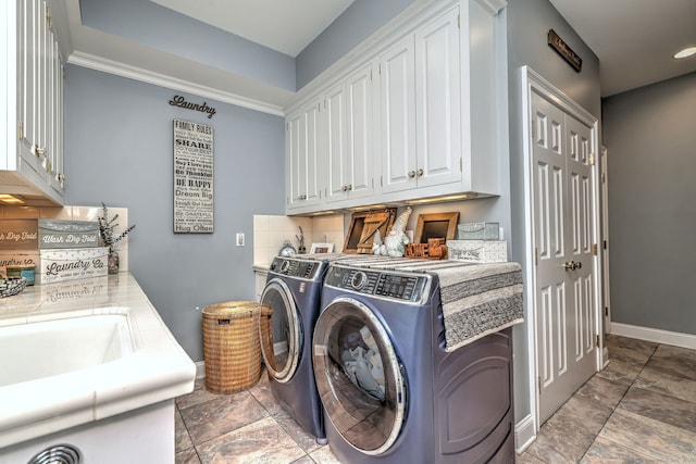 10 Grove Hill Rd, Woodbridge, CT 06525 - washroom with washing machine and clothes dryer, cabinet space, baseboards, and stone finish floors