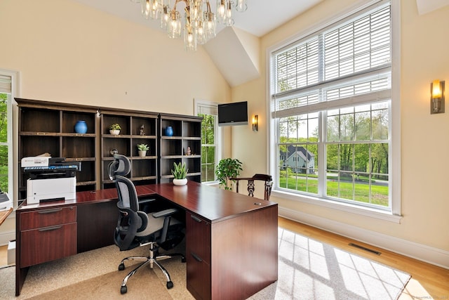 64 Warren Gln, Burlington, CT 06013 - office space with a chandelier, baseboards, light wood-style flooring, and vaulted ceiling