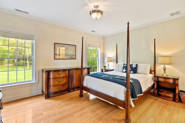 64 Warren Gln, Burlington, CT 06013 - bedroom with light wood-style flooring, ornamental molding, multiple windows, and baseboards