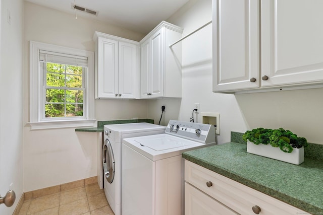 64 Warren Gln, Burlington, CT 06013 - laundry area with cabinet space, separate washer and dryer, baseboards, and light tile patterned floors