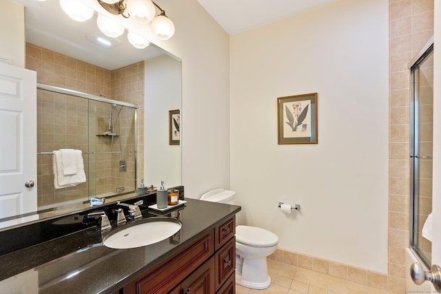 64 Warren Gln, Burlington, CT 06013 - bathroom with tile patterned flooring, a tile shower, and toilet
