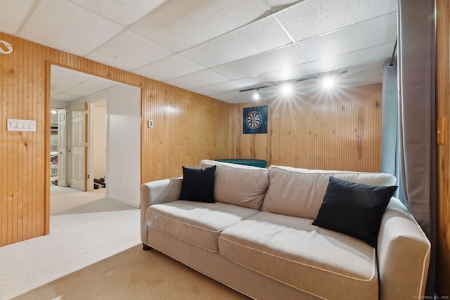 745 Merrow Rd Apt 113, Coventry, CT 06238 - living area featuring carpet floors, wooden walls, and a paneled ceiling