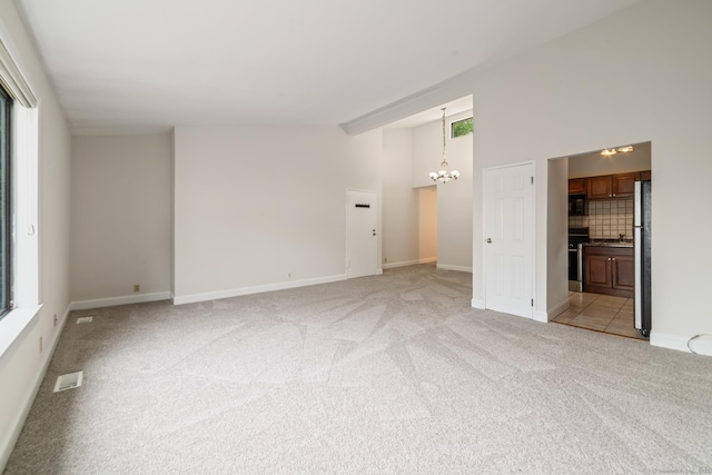 19 Keeler Close Close Unit 19, Ridgefield, CT 06877 - unfurnished room with a chandelier, light colored carpet, and baseboards