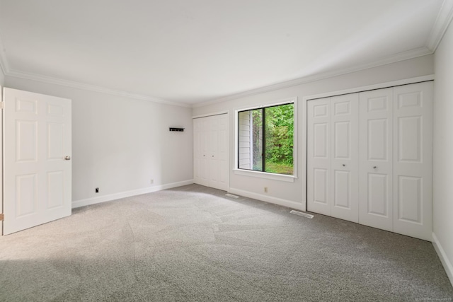 19 Keeler Close Close Unit 19, Ridgefield, CT 06877 - unfurnished bedroom featuring multiple closets, ornamental molding, carpet, and baseboards