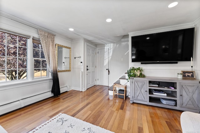17 Saint Thomas St, Enfield, CT 06082 - living area with light wood-type flooring, stairs, crown molding, a baseboard heating unit, and recessed lighting