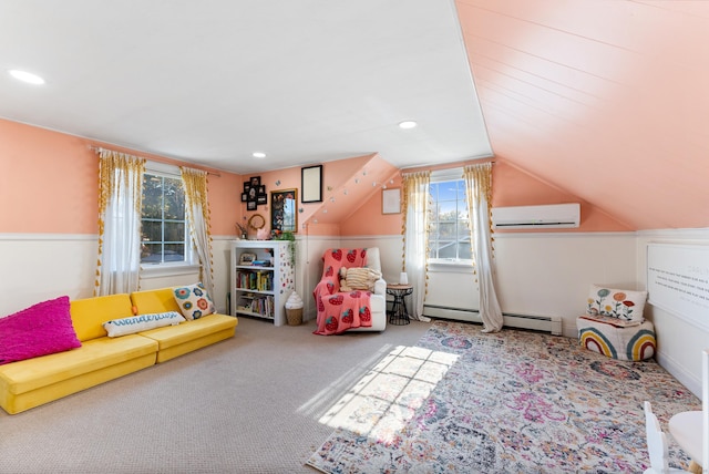 17 Saint Thomas St, Enfield, CT 06082 - rec room featuring an AC wall unit, baseboard heating, healthy amount of natural light, carpet floors, and lofted ceiling