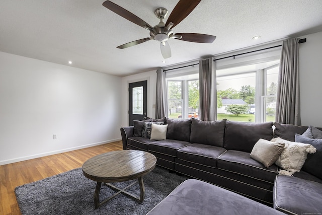 53 Roosevelt Blvd, Enfield, CT 06082 - living room featuring ceiling fan, wood finished floors, baseboards, and recessed lighting