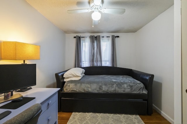 53 Roosevelt Blvd, Enfield, CT 06082 - bedroom with lofted ceiling, dark wood finished floors, a textured ceiling, a ceiling fan, and baseboards