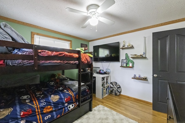 53 Roosevelt Blvd, Enfield, CT 06082 - bedroom featuring ornamental molding, wood finished floors, a textured ceiling, and a ceiling fan