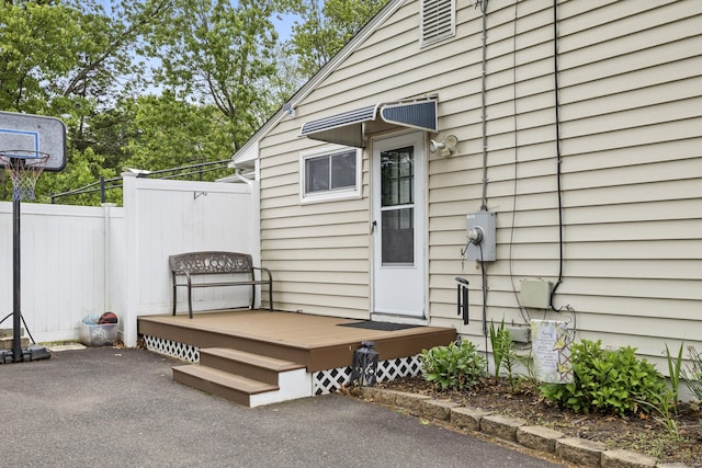 53 Roosevelt Blvd, Enfield, CT 06082 - doorway to property with a deck and a patio area