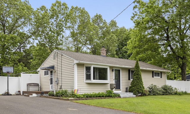 53 Roosevelt Blvd, Enfield, CT 06082 - view of front of house with a chimney