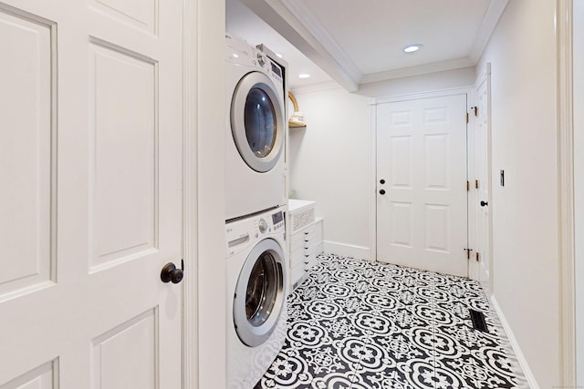 3 Inwood Ln, Woodbury, CT 06798 - laundry area with stacked washing machine and dryer, ornamental molding, and recessed lighting