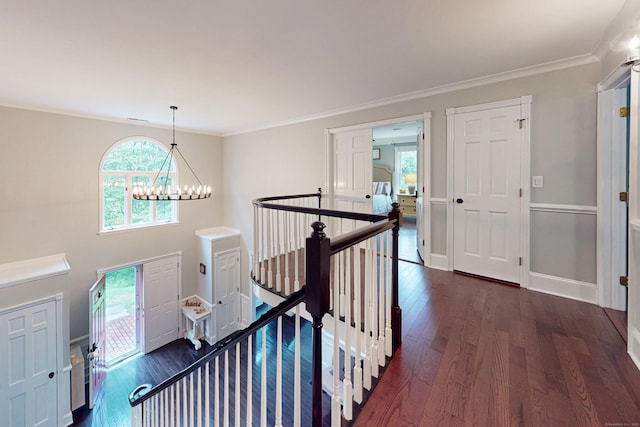 3 Inwood Ln, Woodbury, CT 06798 - hall featuring an upstairs landing, a chandelier, dark wood-type flooring, and ornamental molding