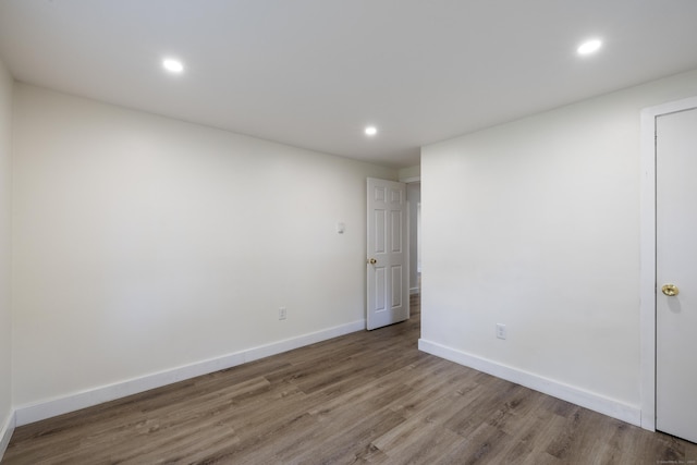 53 Kalish Ave, Enfield, CT 06082 - spare room with wood finished floors, recessed lighting, and baseboards