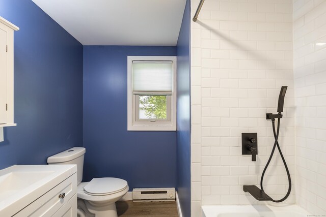 53 Kalish Ave, Enfield, CT 06082 - bathroom featuring a baseboard radiator, a shower, toilet, wood finished floors, and vanity