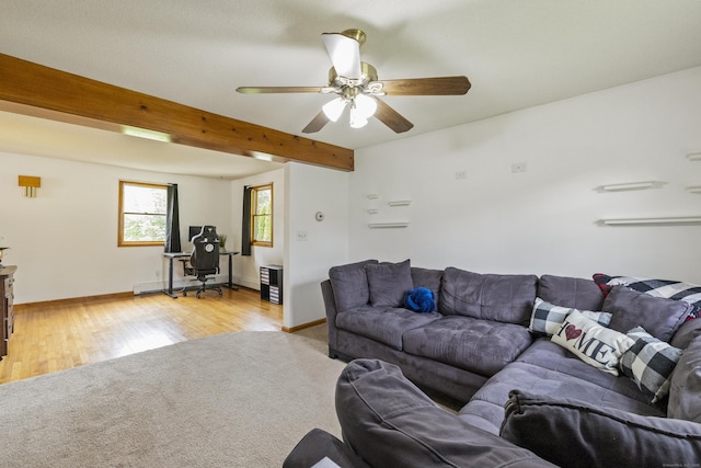 49 First Ave, Enfield, CT 06082 - living area with a ceiling fan, beamed ceiling, light wood finished floors, and baseboards