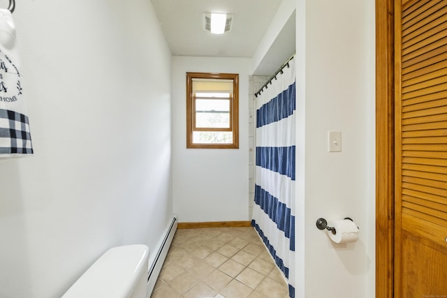 49 First Ave, Enfield, CT 06082 - bathroom featuring toilet, baseboard heating, baseboards, tile patterned floors, and a shower with shower curtain