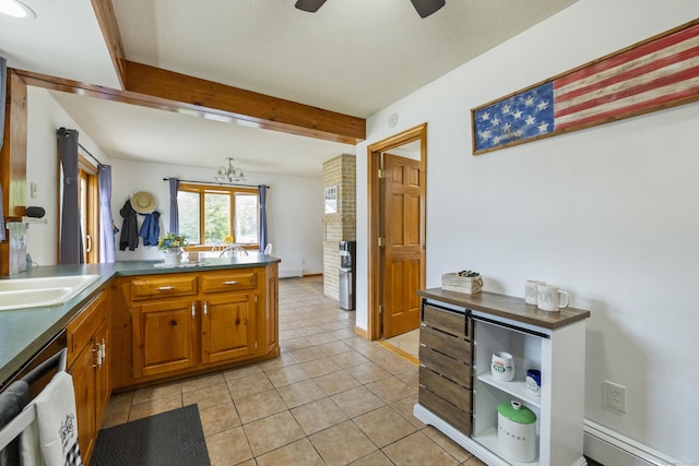 49 First Ave, Enfield, CT 06082 - kitchen with a peninsula, light tile patterned floors, baseboard heating, dishwasher, and beamed ceiling