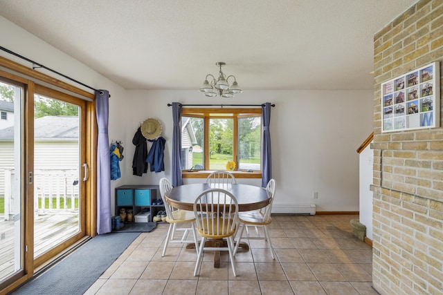 49 First Ave, Enfield, CT 06082 - dining space with baseboard heating, a chandelier, plenty of natural light, and light tile patterned floors