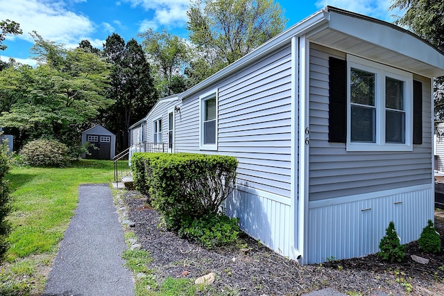 66 Nancy Ln, Naugatuck, CT 06770 - view of side of home with a yard