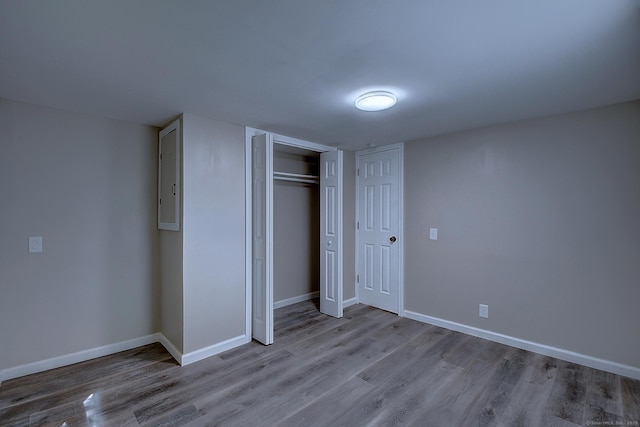 66 Nancy Ln, Naugatuck, CT 06770 - unfurnished bedroom with wood finished floors, baseboards, and a closet