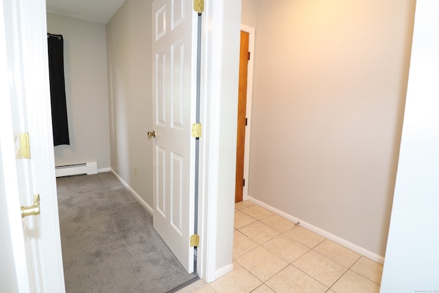 678 Savin Ave Apt 2J, West Haven, CT 06516 - corridor with a baseboard radiator, baseboards, and light tile patterned floors
