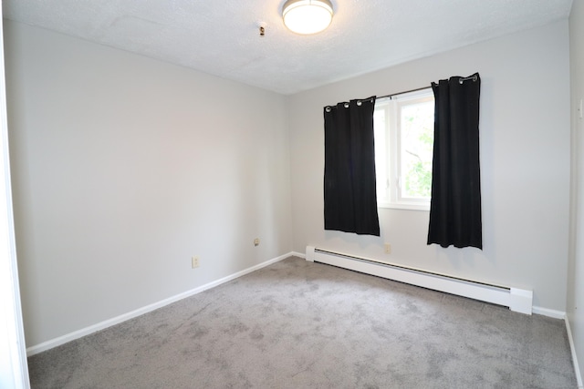 678 Savin Ave Apt 2J, West Haven, CT 06516 - spare room with a baseboard heating unit, carpet, and baseboards