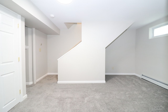 678 Savin Ave Apt 2J, West Haven, CT 06516 - below grade area with carpet flooring, baseboards, and a baseboard heating unit