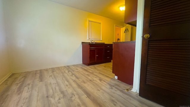 125 Lebanon St, Hartford, CT 06112 - corridor with light wood-style floors, a sink, and baseboards