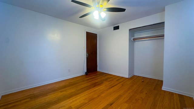 125 Lebanon St, Hartford, CT 06112 - unfurnished bedroom with a closet, wood finished floors, baseboards, and ceiling fan