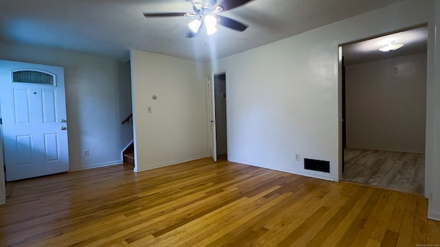 125 Lebanon St, Hartford, CT 06112 - empty room with light wood finished floors, a ceiling fan, stairs, and baseboards