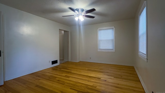 125 Lebanon St, Hartford, CT 06112 - unfurnished room featuring wood finished floors, a ceiling fan, and baseboards