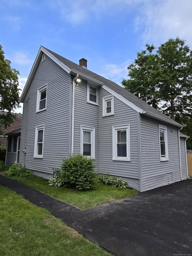 11 Caya Ave, West Hartford, CT 06110 - view of property exterior featuring a chimney