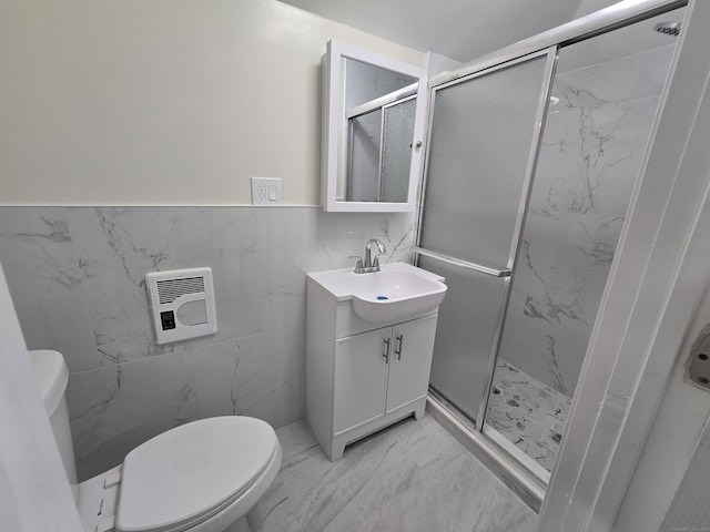 11 Caya Ave, West Hartford, CT 06110 - full bathroom featuring toilet, a stall shower, marble finish flooring, vanity, and tile walls