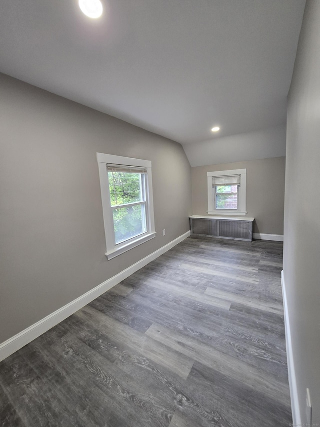11 Caya Ave, West Hartford, CT 06110 - spare room with baseboards, wood finished floors, recessed lighting, and lofted ceiling