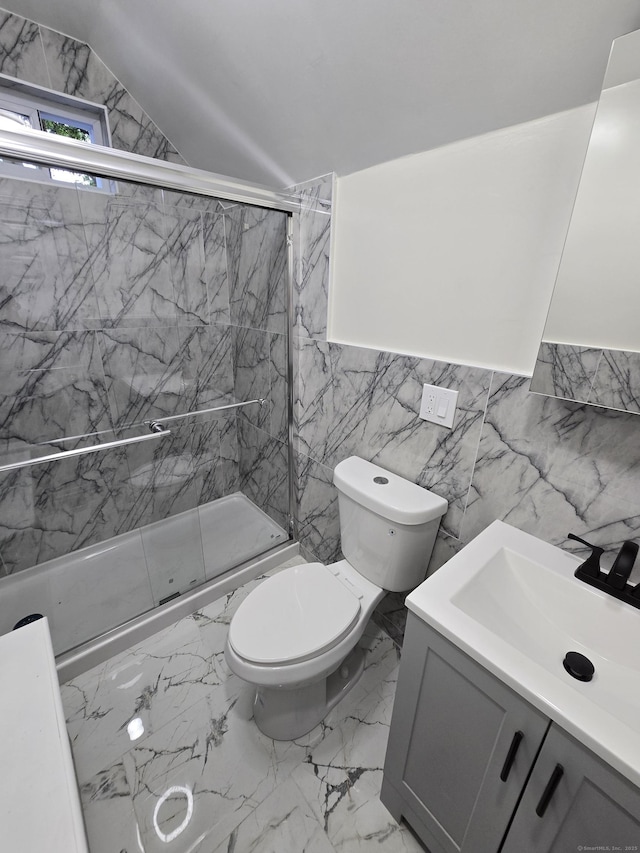 11 Caya Ave, West Hartford, CT 06110 - full bathroom with toilet, a stall shower, vanity, marble finish floors, and tile walls