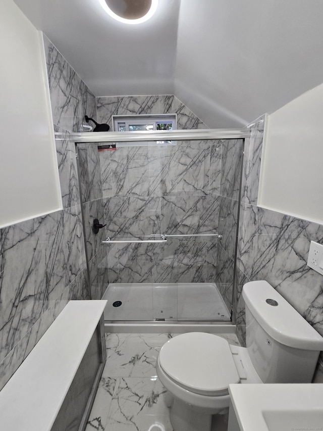 11 Caya Ave, West Hartford, CT 06110 - full bath featuring marble look tile flooring, tile walls, toilet, a marble finish shower, and lofted ceiling