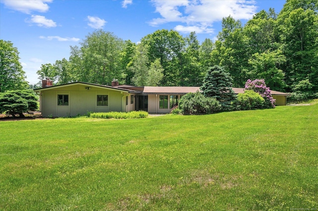 7 Sugar Loaf Cut, Simsbury, CT 06092 - view of front of property with a chimney and a front yard