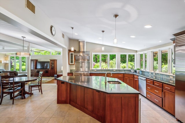 7 Sugar Loaf Cut, Simsbury, CT 06092 - kitchen with stainless steel appliances, a sink, lofted ceiling, open floor plan, and dark countertops