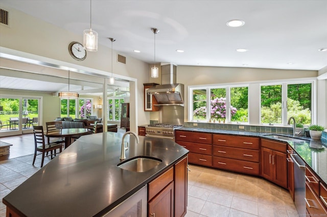 7 Sugar Loaf Cut, Simsbury, CT 06092 - kitchen with a sink, appliances with stainless steel finishes, vaulted ceiling, decorative light fixtures, and light tile patterned flooring