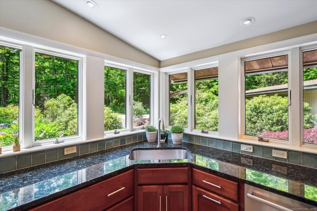 7 Sugar Loaf Cut, Simsbury, CT 06092 - kitchen featuring a sink, dishwasher, lofted ceiling, dark stone counters, and decorative backsplash