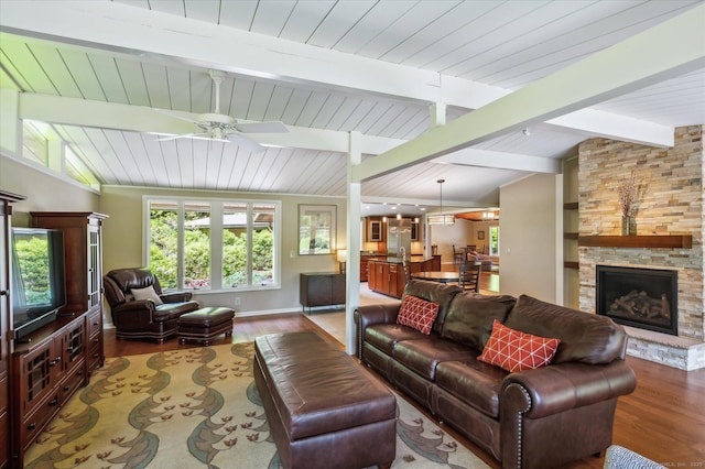 7 Sugar Loaf Cut, Simsbury, CT 06092 - living area with wood finished floors, a stone fireplace, wood ceiling, ceiling fan, and baseboards