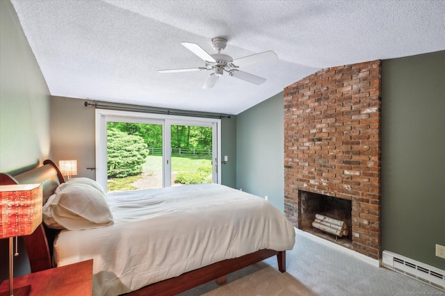 7 Sugar Loaf Cut, Simsbury, CT 06092 - carpeted bedroom with a baseboard heating unit, vaulted ceiling, a brick fireplace, a textured ceiling, and a ceiling fan