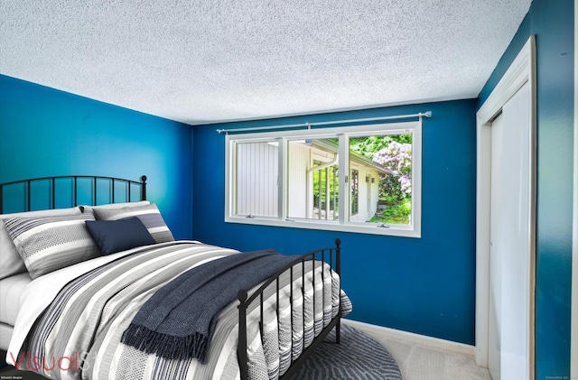7 Sugar Loaf Cut, Simsbury, CT 06092 - carpeted bedroom featuring a textured ceiling and baseboards