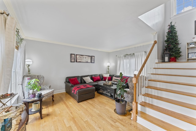 1095 Hope St Unit B, Stamford, CT 06907 - living room with plenty of natural light, crown molding, wood finished floors, stairs, and baseboards