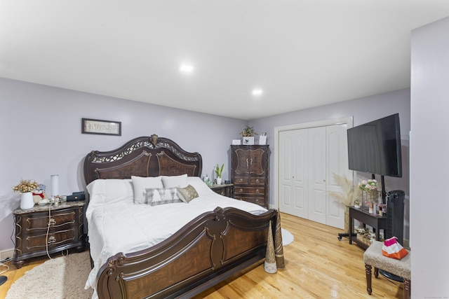 1095 Hope St Unit B, Stamford, CT 06907 - bedroom featuring a closet, light wood-type flooring, and recessed lighting